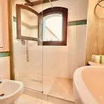 With A Private Free Sun Bed And Umbrellas Vakantiehuis Porto Cervo